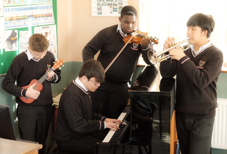 Students from Ennis Community College play music. Photograph by Paul Corey