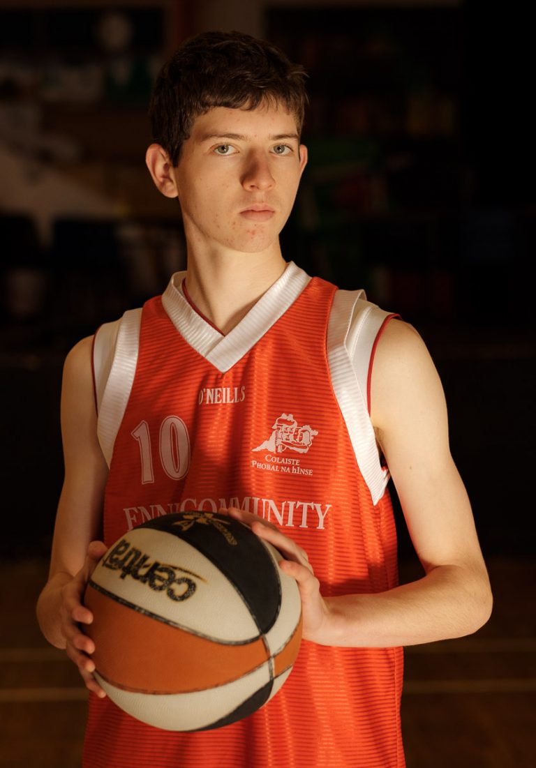 Student from Ennis Community College with basketball. Photograph by Paul Corey